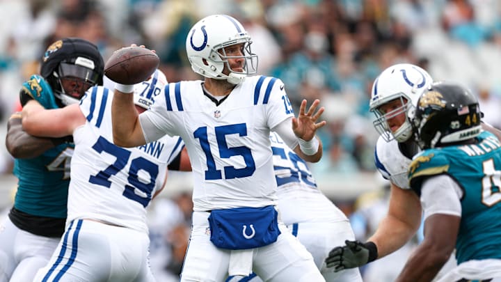 Oct 6, 2024; Jacksonville, Florida, USA; Indianapolis Colts quarterback Joe Flacco (15) drops back to pass against the Jacksonville Jaguars in the second quarter at EverBank Stadium.