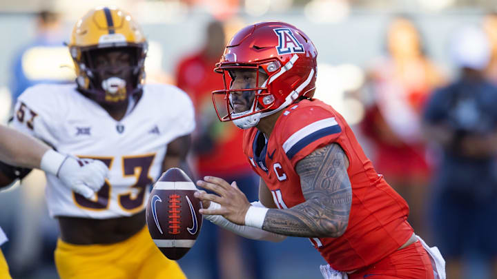 Nov 30, 2024; Tucson, Arizona, USA; Arizona Wildcats quarterback Noah Fifita (11) against the Arizona State Sun Devils during the Territorial Cup at Arizona Stadium.