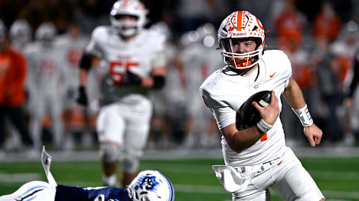 Celina quarterback Bowe Bentley scrambles with the ball during the Bobcats’ Class 4A Div. I semi-final game against West Plains in Abilene Dec. 13, 2024. Final score was 43-36, Celina.