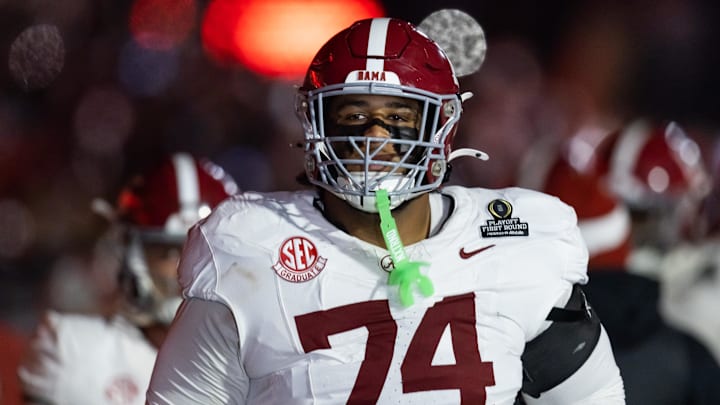 Kadyn Proctor warms up before College Football Playoff. Kadyn Proctor warms up before College Football Playoff.
