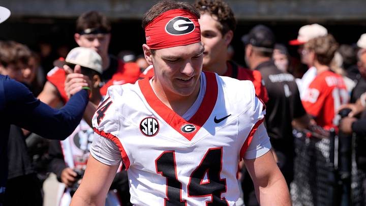 Georgia quarterback Gunner Stockton (14) arrives before the start of the Georgia G-Day spring football game in Athens, Ga., on Saturday, April 12, 2025.