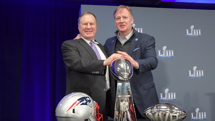 Feb 4, 2019; Atlanta, GA, USA; New England Patriots coach Bill Belichick (left) and NFL commissioner Roger Goodell pose with the Vince Lombardi trophy and Pete Rozelle most valuble player trophy during Super Bowl LIII winning team press conference at Georgia World Congress Center. The Patriots defeated the Los Angeles Rams 13-3 to win an NFL record-tying sixth championship  