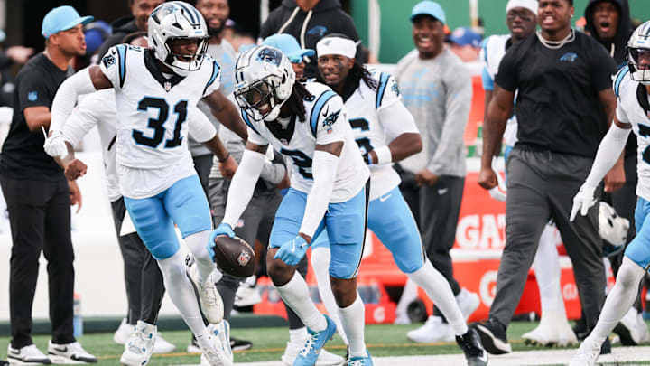 Carolina Panthers cornerback Jaycee Horn celebrates an interception intended for New York Jets wide receiver Josh Reynolds. Carolina Panthers cornerback Jaycee Horn celebrates an interception intended for New York Jets wide receiver Josh Reynolds.