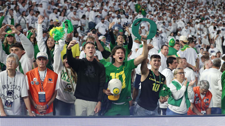 Sep 27, 2025; University Park, Pennsylvania, USA; Oregon Ducks fans react during overtime against the Penn State Nittany Lions  at Beaver Stadium. Mandatory Credit: Matthew O'Haren-Imagn Images