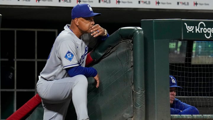 Los Angeles Dodgers manager Dave Roberts (30) looks on from the dugout in the ninth inning of the MLB National League game between the Cincinnati Reds and the Los Angeles Dodgers at Great American Ball Park in downtown Cincinnati on Tuesday, July 29, 2025. The Dodgers won 5-4.