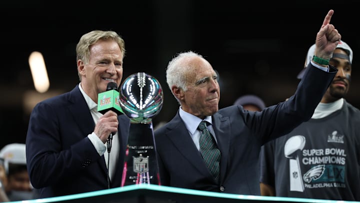  NFL commissioner Roger Goodell (L) stands with Philadelphia Eagles owner Jeffrey Lurie (R) during the championship trophy presentation after the Eagles' game against the Kansas City Chiefs in Super Bowl LIX at Caesars Superdome. 