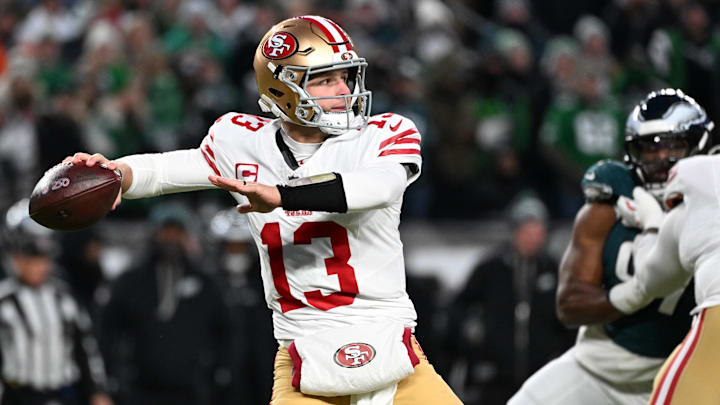 Jan 11, 2026; Philadelphia, PA, USA; San Francisco 49ers quarterback Brock Purdy (13) passes the ball against the Philadelphia Eagles during the first quarter in an NFC Wild Card Round game at Lincoln Financial Field. Mandatory Credit: Eric Hartline-Imagn Images