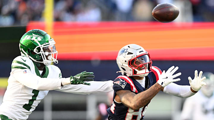 Oct 27, 2024; Foxborough, Massachusetts, USA; New England Patriots wide receiver Kendrick Bourne (84) fails to catch a pass thrown by quarterback Jacoby Brissett (not seen) in front of New York Jets cornerback Sauce Gardner (1) during the second half at Gillette Stadium. 