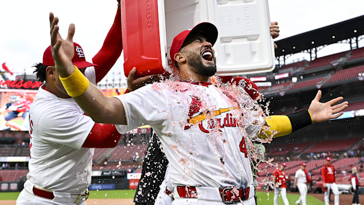 Apr 2, 2025; St. Louis, Missouri, USA;  St. Louis Cardinals catcher Ivan Herrera (48) has a cooler poured on him by first baseman Willson Contreras (40) and Pedro Pages (43) after he hit three home runs in a victory over the Los Angeles Angels at Busch Stadium. Mandatory Credit: Jeff Curry-Imagn Images