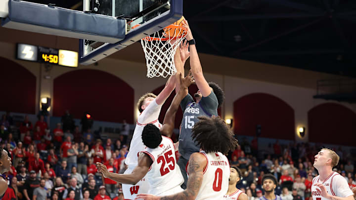 Nov 28, 2025; San Diego, CA, USA; Texas Christian University Horned Frogs forward David Punch (15) dunks the ball against Wisconsin Badgers during the second half at Jenny Craig Pavilion. 