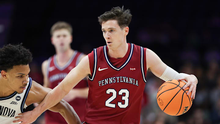 Dec 6, 2025; Philadelphia, PA, USA; Penn Quakers forward Ethan Roberts (23) dribbles the ball against the Villanova Wildcats during the first half at Xfinity Mobile Arena. Mandatory Credit: Bill Streicher-Imagn Images Dec 6, 2025; Philadelphia, PA, USA; Penn Quakers forward Ethan Roberts (23) dribbles the ball against the Villanova Wildcats during the first half at Xfinity Mobile Arena. Mandatory Credit: Bill Streicher-Imagn Images