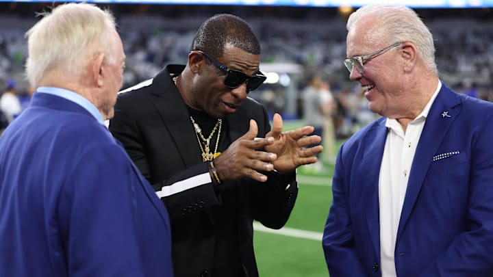 Colorado Buffaloes head coach Deion Sanders talks with Dallas Cowboys owner Jerry Jones and Cowboys CEO Stephen Jones. Colorado Buffaloes head coach Deion Sanders talks with Dallas Cowboys owner Jerry Jones and Cowboys CEO Stephen Jones.