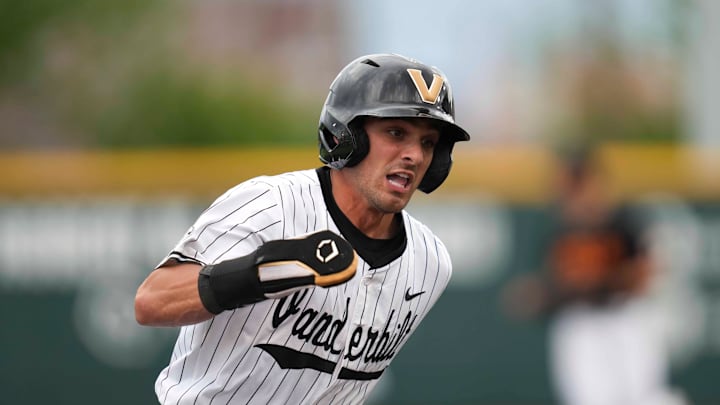 Vanderbilt infielder Mike Mancini (5) runs around third base during a NCAA baseball game between the Tennessee Volunteers and Vanderbilt Commodores at Lindsey Nelson Stadium on May 11, 2025.