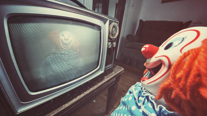 Clown watching TV Clown watching TV