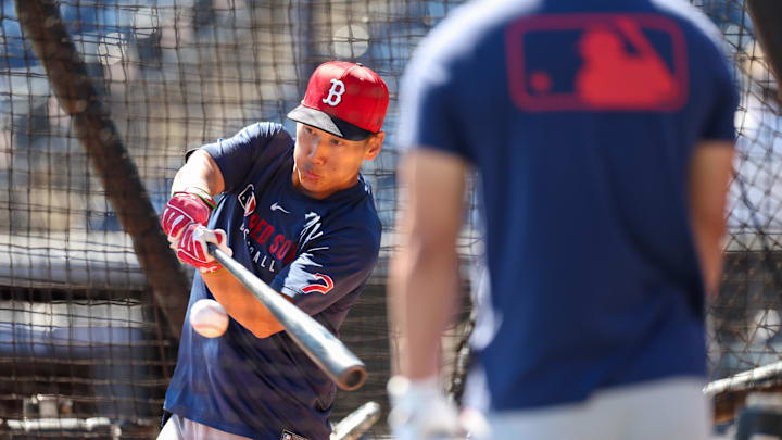 Mar 18, 2025; Tampa, Florida, USA;  Boston Red Sox outfielder Masataka Yoshida (7) takes batting practice before a  spring training game against the New York Yankees at George M. Steinbrenner Field. Mandatory Credit: Nathan Ray Seebeck-Imagn Images