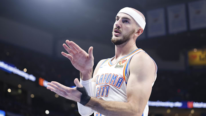 Nov 20, 2024; Oklahoma City, Oklahoma, USA; Oklahoma City Thunder guard Alex Caruso (9) reacts after a play against the Portland Trail Blazers during the second quarter at Paycom Center. Mandatory Credit: Alonzo Adams-Imagn Images