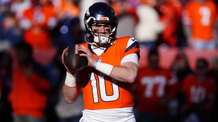 Jan 17, 2026; Denver, CO, USA; Denver Broncos quarterback Bo Nix (10) warms up before an AFC Divisional Round playoff game against the Buffalo Bills at Empower Field at Mile High. Mandatory Credit: Ron Chenoy-Imagn Images