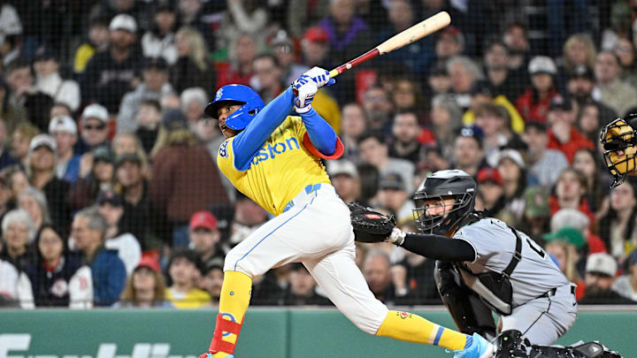 Apr 18, 2025; Boston, Massachusetts, USA; Boston Red Sox center fielder Ceddanne Rafaela (3) hits a two-run home run against the Chicago White Sox during the fourth inning at Fenway Park. Mandatory Credit: Eric Canha-Imagn Images