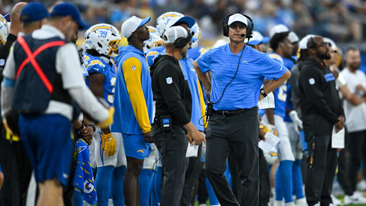Aug 10, 2024; Inglewood, California, USA; Los Angeles Chargers head coach Jim Harbaugh on the sidelines against the Seattle Seahawks during the fourth quarter at SoFi Stadium.
