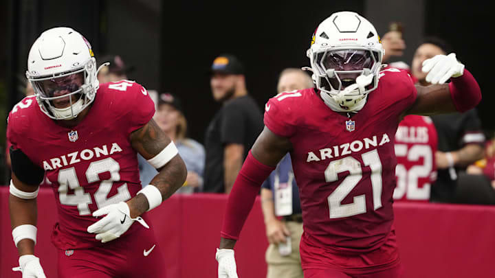 Cardinals cornerback Garrett Williams (21) celebrates an interception against the Commanders during a game at State Farm Stadium in Glendale on Sept. 29, 2024.