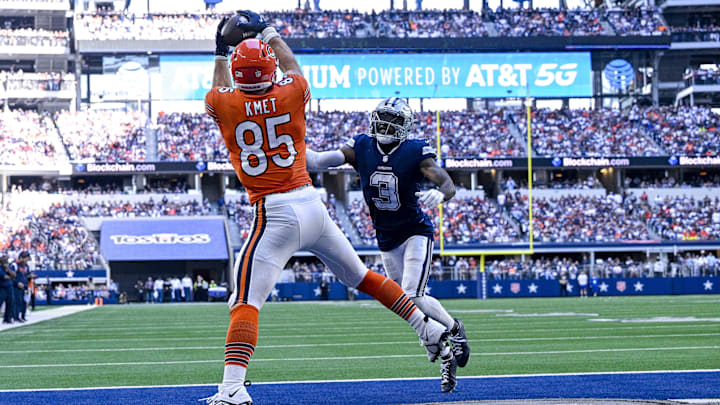 Cole Kmet catches a TD pass at Dallas in 2022. The Cowboys come to Chicago next season for the first time since 2019.