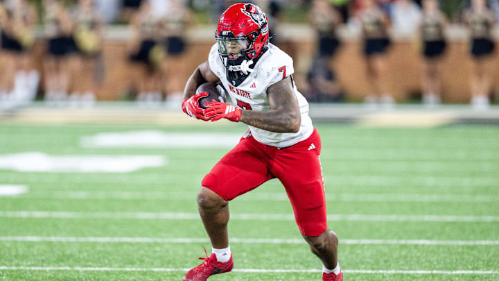 Sep 11, 2025; Winston-Salem, North Carolina, USA; North Carolina State Wolfpack tight end Justin Joly (7) catches a pass against the Wake Forest Demon Deacons in second half at Allegacy Federal Credit Union Stadium. Mandatory Credit: Luke Jamroz-Imagn Images