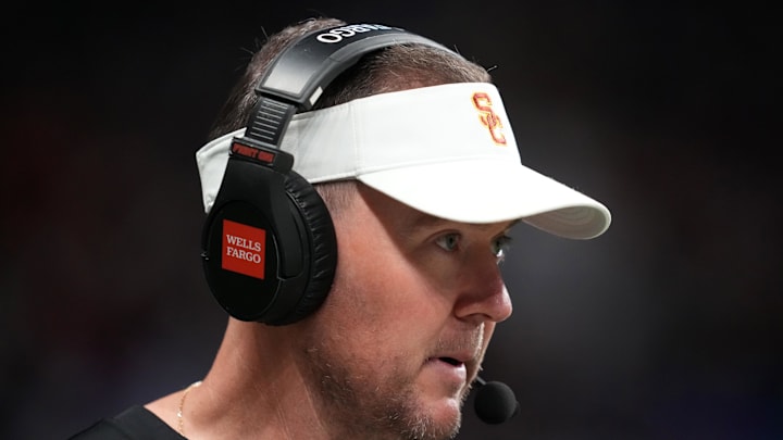 Dec 30, 2025; San Antonio, TX, USA; Southern California Trojans head coach Lincoln Riley watches in the first half against the TCU Horned Frogs during the Alamo Bowl at Alamodome. Mandatory Credit: Kirby Lee-Imagn Images