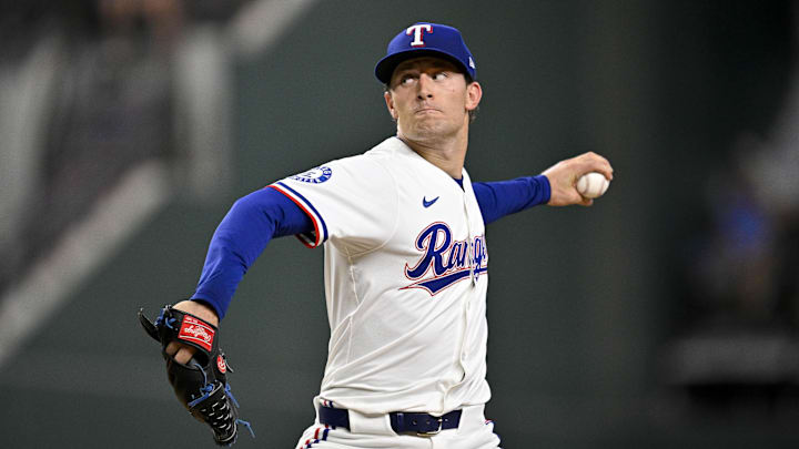 Jun 19, 2025; Arlington, Texas, USA; Texas Rangers relief pitcher Jacob Latz (67) pitches against the Kansas City Royals during the game at Globe Life Field. 
