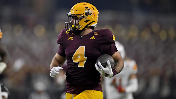 Arizona State Sun Devils running back Cam Skattebo (4). Arizona State Sun Devils running back Cam Skattebo (4).