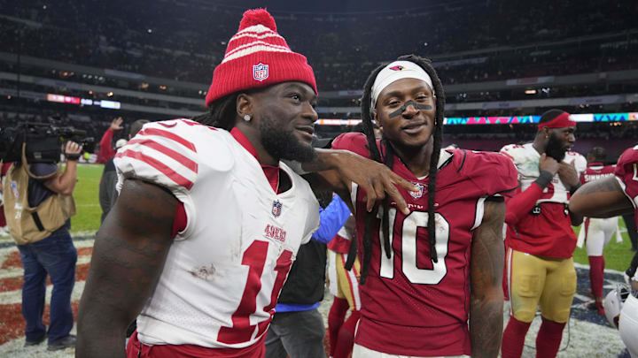 San Francisco 49ers wide receiver Brandon Aiyuk (11) and Arizona Cardinals wide receiver DeAndre Hopkins (10)