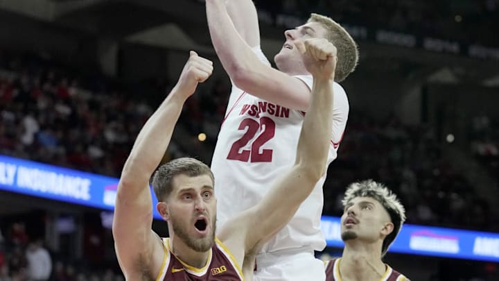 Wisconsin forward Steven Crowl (22) makes a shot and Minnesota forward Parker Fox (23) reacts to a call during the second half of their game Friday, January 10, 2025 at the Kohl Center in Madison, Wisconsin. Wisconsin beat Minnesota 80-59. Wisconsin forward Steven Crowl (22) makes a shot and Minnesota forward Parker Fox (23) reacts to a call during the second half of their game Friday, January 10, 2025 at the Kohl Center in Madison, Wisconsin. Wisconsin beat Minnesota 80-59.