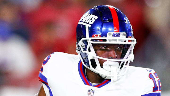 Nov 22, 2021; Tampa, Florida, USA;  New York Giants wide receiver John Ross (12) runs with the ball in the first half against the Tampa Bay Buccaneers at Raymond James Stadium. Mandatory Credit: Nathan Ray Seebeck-USA TODAY Sports