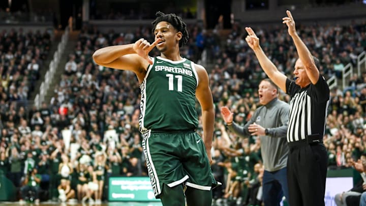 Michigan State's A.J. Hoggard celebrates a 3-pointer against Penn State during the first half on