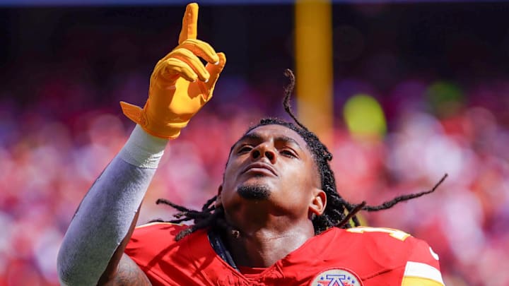 Sep 15, 2024; Kansas City, Missouri, USA; Kansas City Chiefs running back Isiah Pacheco (10) kneels in the end zone against the Cincinnati Bengals prior to a game at GEHA Field at Arrowhead Stadium. Mandatory Credit: Denny Medley-Imagn Images
