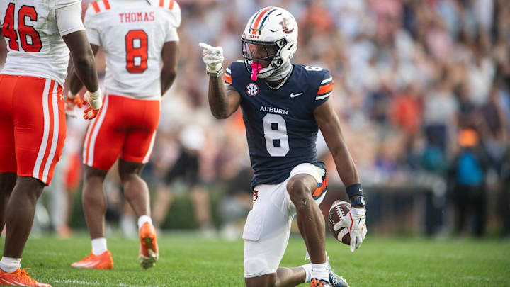 Auburn Tigers wide receiver Cam Coleman (8) celebrates a first down as Auburn Tigers take on Mercer
