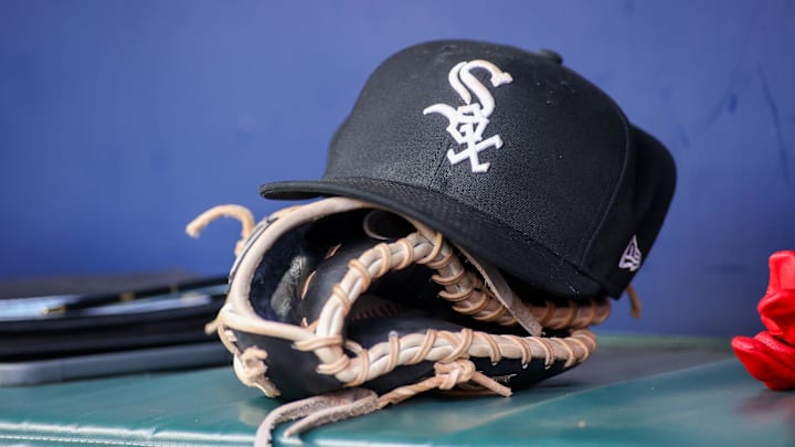 Jul 15, 2023; Atlanta, Georgia, USA; A detailed view of a Chicago White Sox hat and glove in the dugout against the Atlanta Braves in the first inning at Truist Park. Mandatory Credit: Brett Davis-Imagn Images Jul 15, 2023; Atlanta, Georgia, USA; A detailed view of a Chicago White Sox hat and glove in the dugout against the Atlanta Braves in the first inning at Truist Park. Mandatory Credit: Brett Davis-Imagn Images