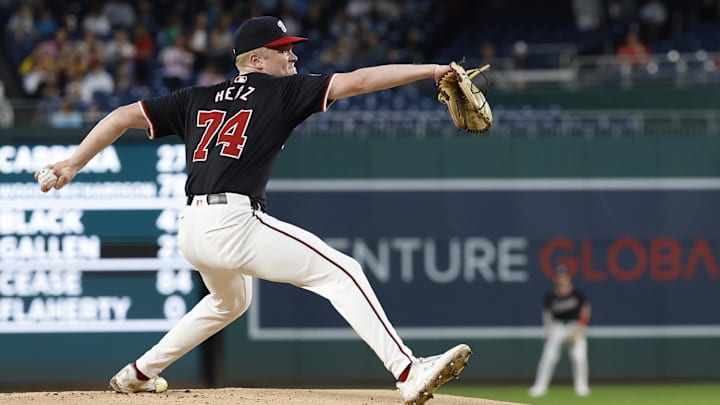 Sep 25, 2024; Washington, District of Columbia, USA; Washington Nationals starting pitcher DJ Herz (74) pitches against the Kansas City Royals during the first inning at Nationals Park.