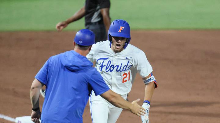 Florida utility Caden McDonald (21) celebrates his home run against Texas A&M during an NCAA baseball game at Condron Family Ballpark at Alfred A. McKethan Field in Gainesville, FL on Friday, April 24, 2026. [Alan Youngblood/Gainesville Sun]