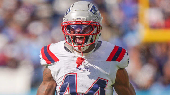 New England Patriots linebacker K'Lavon Chaisson (44) celebrates his sack of Tennessee Titans quarterback Cam Ward (1) during the third quarter at Nissan Stadium in Nashville, Tenn., Sunday, Oct. 19, 2025.