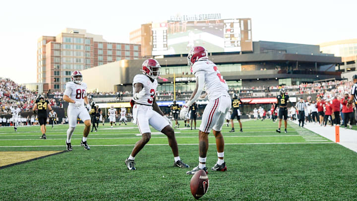 Oct 5, 2024; Nashville, Tennessee, USA;  Alabama Crimson Tide wide receiver Ryan Williams (2) celebrates with wide receiver Emmanuel Henderson Jr. (3)  after scoring a touchdown against the Vanderbilt Commodores during the second half at FirstBank Stadium. Mandatory Credit: Steve Roberts-Imagn Images