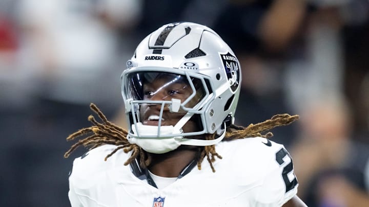 Aug 23, 2025; Glendale, Arizona, USA; Las Vegas Raiders running back Ashton Jeanty (2) against the Arizona Cardinals during a preseason NFL game at State Farm Stadium. Mandatory Credit: Mark J. Rebilas-Imagn Images