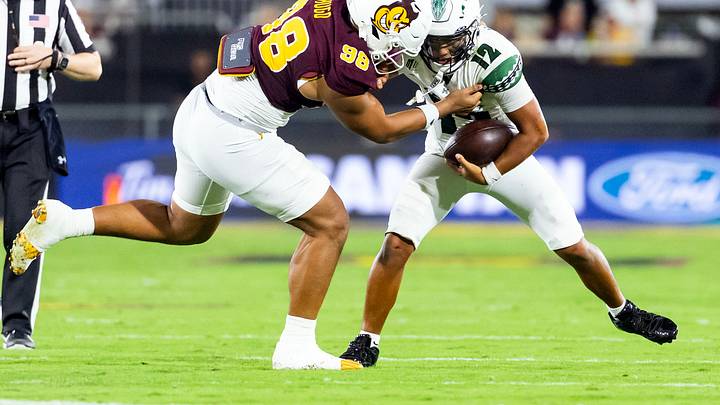 Oct 10, 2026; Tempe, Arizona, USA; Hawaii Rainbow Warriors quarterback Micah Alejado (12) is sacked by Arizona State Sun Devils defensive lineman Julian Hugo (98) in the first half at Mountain America Stadium. Oct 10, 2026; Tempe, Arizona, USA; Hawaii Rainbow Warriors quarterback Micah Alejado (12) is sacked by Arizona State Sun Devils defensive lineman Julian Hugo (98) in the first half at Mountain America Stadium.