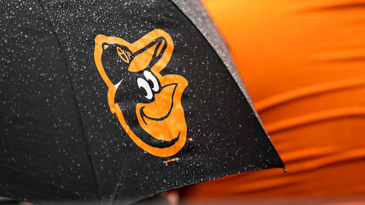 Aug 22, 2021; Baltimore, Maryland, USA; A Baltimore Orioles logo is seen on an umbrella during the game between the Baltimore Orioles and the Atlanta Braves at Oriole Park at Camden Yards. Mandatory Credit: Scott Taetsch-USA TODAY Sports