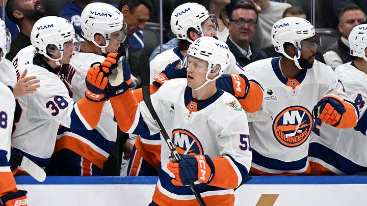 Sep 30, 2026; Toronto, Ontario, CAN; New York Islanders forward Emil Heineman (51) celebrates with team mates at the bench after scoring a goal against the Toronto Maple Leafs in the third period at Scotiabank Arena. Mandatory Credit: Dan Hamilton-Imagn Images Sep 30, 2026; Toronto, Ontario, CAN; New York Islanders forward Emil Heineman (51) celebrates with team mates at the bench after scoring a goal against the Toronto Maple Leafs in the third period at Scotiabank Arena. Mandatory Credit: Dan Hamilton-Imagn Images