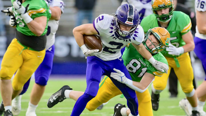 Anacortes wide receiver Brady Beaner pulls away from a defender in WIAA Class 2A championship game. Anacortes wide receiver Brady Beaner pulls away from a defender in WIAA Class 2A championship game.