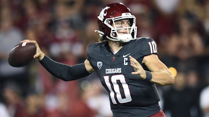 Sep 7, 2024; Pullman, Washington, USA; Washington State Cougars quarterback John Mateer (10) throws a pass against the Texas Tech Red Raiders in the first half at Gesa Field at Martin Stadium. Mandatory Credit: James Snook-Imagn Images