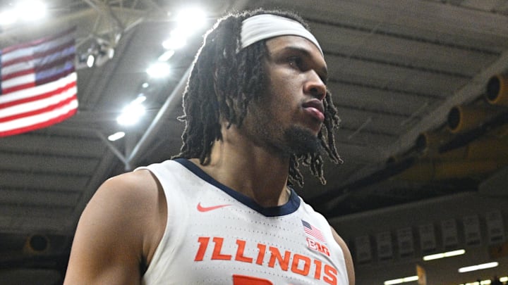 Mar 10, 2024; Iowa City, Iowa, USA; Illinois Fighting Illini forward Ty Rodgers (20) walks off the court after the game against the Iowa Hawkeyes at Carver-Hawkeye Arena. Mandatory Credit: Jeffrey Becker-Imagn Images