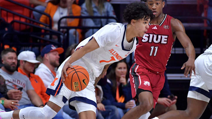 Nov 8, 2024; Champaign, Illinois, USA; Illinois Fighting Illini forward Will Riley (7) drives against SIU Edwardsville Cougars guard Brian Taylor II (11) during the second half at State Farm Center. Mandatory Credit: Ron Johnson-Imagn Images Nov 8, 2024; Champaign, Illinois, USA; Illinois Fighting Illini forward Will Riley (7) drives against SIU Edwardsville Cougars guard Brian Taylor II (11) during the second half at State Farm Center. Mandatory Credit: Ron Johnson-Imagn Images