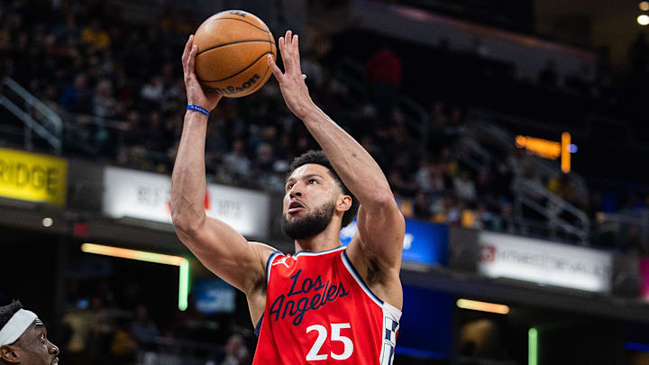 Feb 23, 2025; Indianapolis, Indiana, USA;  LA Clippers guard Ben Simmons (25) shoots the ball while Indiana Pacers forward Pascal Siakam (43) defends in the first half at Gainbridge Fieldhouse. Mandatory Credit: Trevor Ruszkowski-Imagn Images