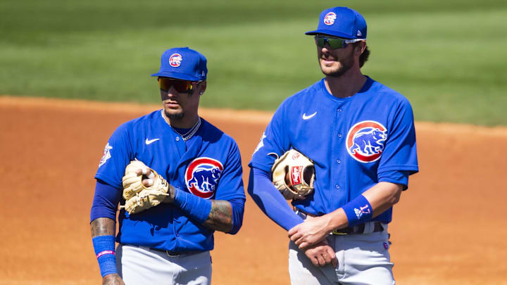 Mar 22, 2021; Tempe, Arizona, USA; Chicago Cubs shortstop Javier Baez (left) and third baseman Kris Bryant against the Los Angeles Angels during a Spring Training game at Tempe Diablo Stadium